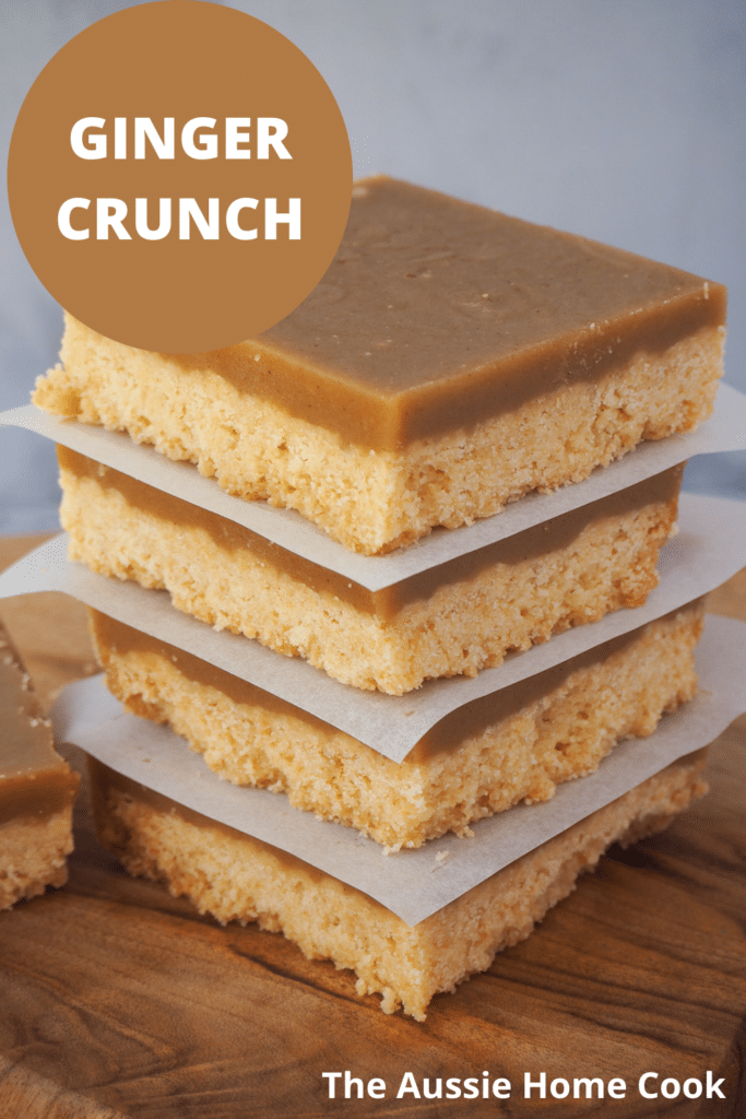 Stack of ginger crunch on a board, with text overlay, ginger crunch and The Aussie Home Cook.