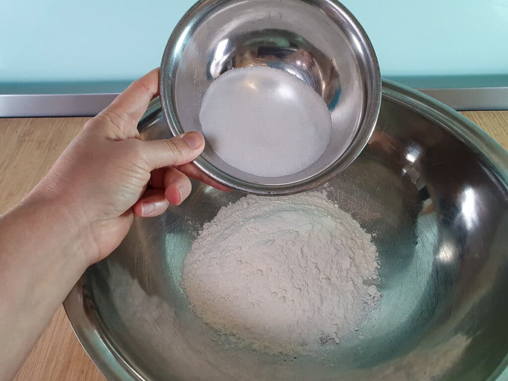 Adding sugar to bowl for base.