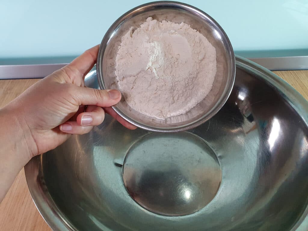 Adding flour to bowl for base.
