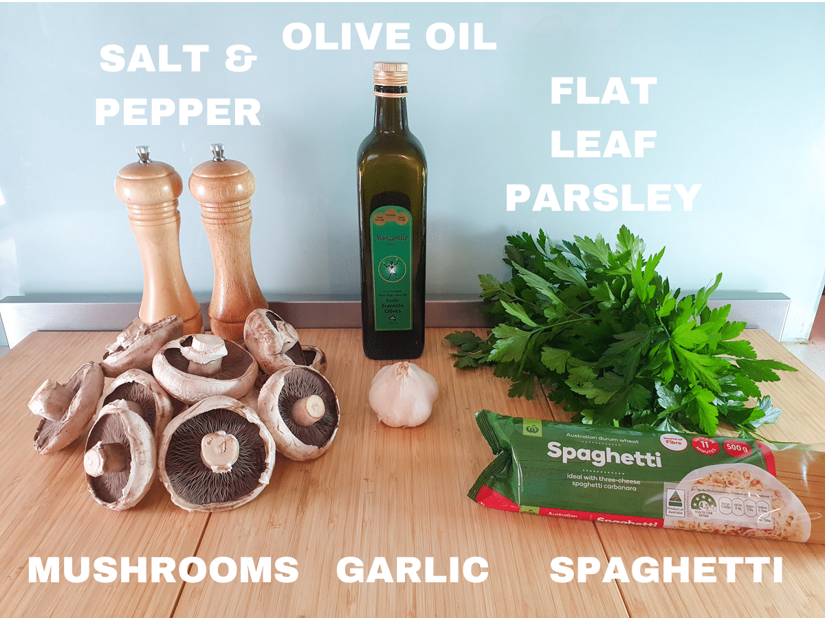 Mushroom aglio olio ingredients, mushrooms, garlic cloves, salt and pepper, olive oil, flat leaf parsley, spaghetti.