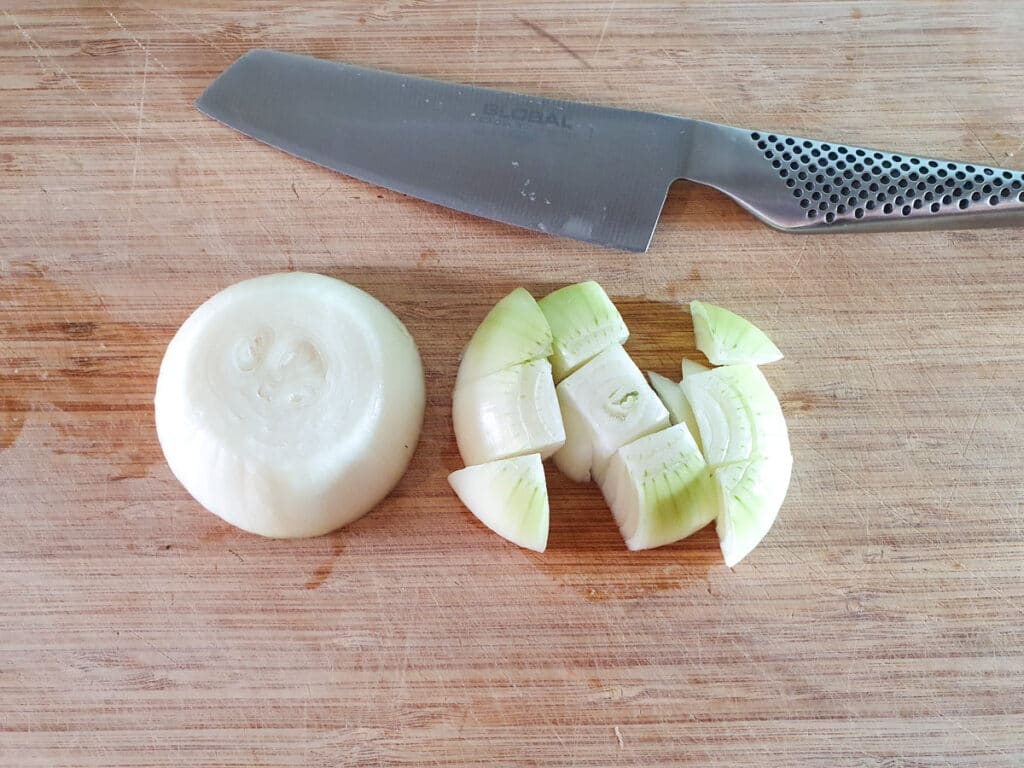 Cutting up the onion.