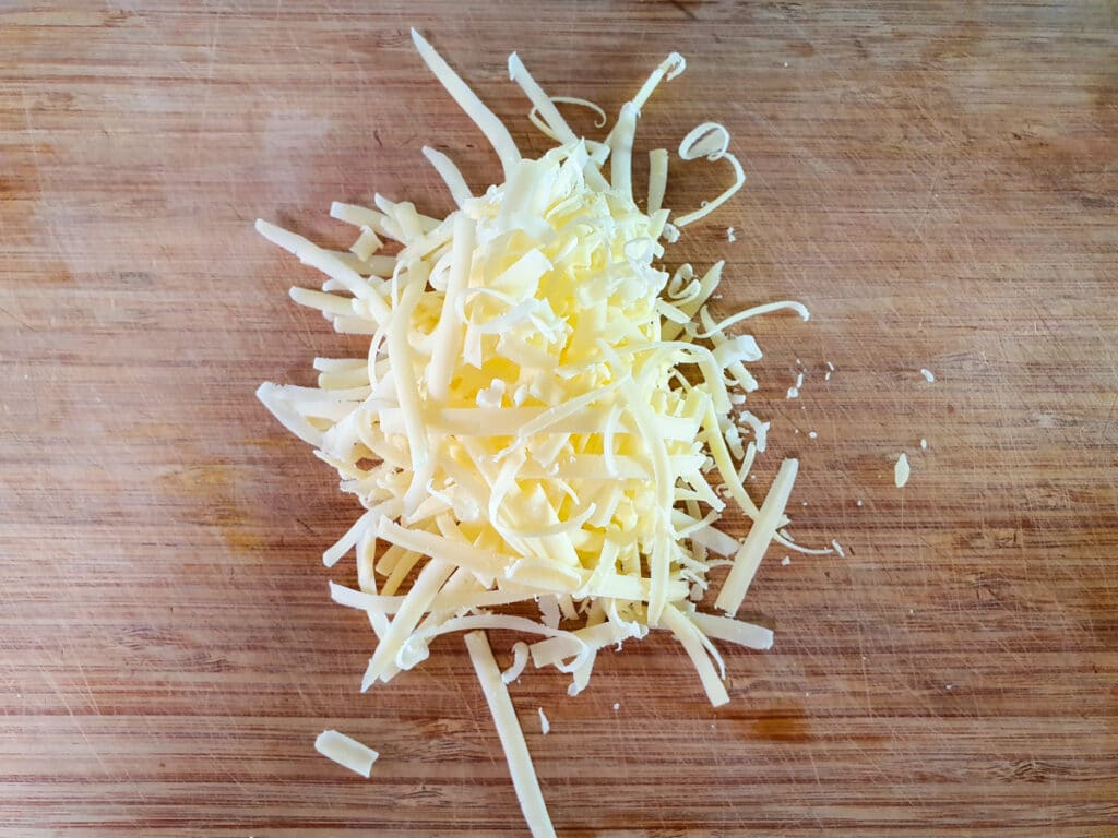 Grating cheese.